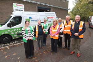 Ms Lucy Winskell OBE pictured alongside her Deputy Lieutenants and FareShare North East Staff in front of a FareShare North East delivery van.